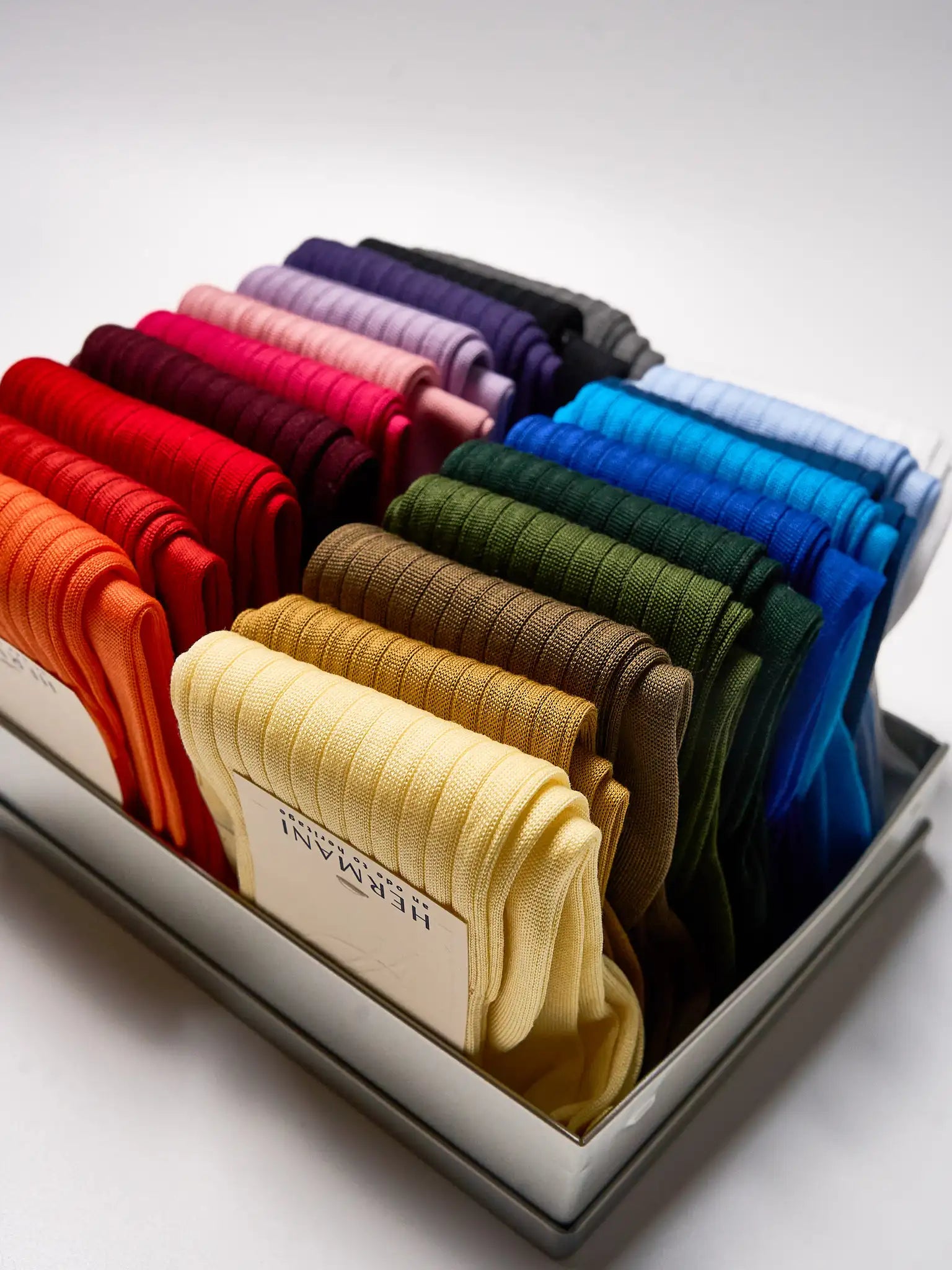 Italian luxury sock color palette: refined shades of natural yarns